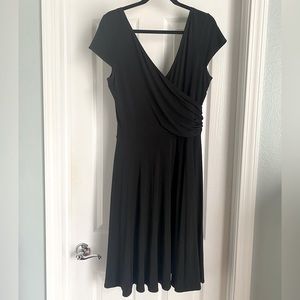Black, faux wrap, short sleeved dress by Maggy London, size 16, gently used.